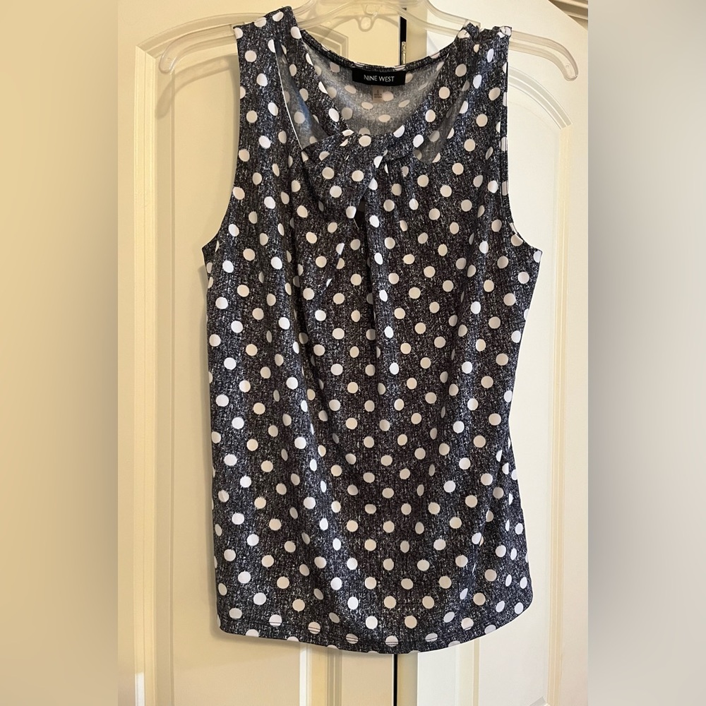Nine west sleeveless top with keyhole straps at neckline. Very cute. flattering!